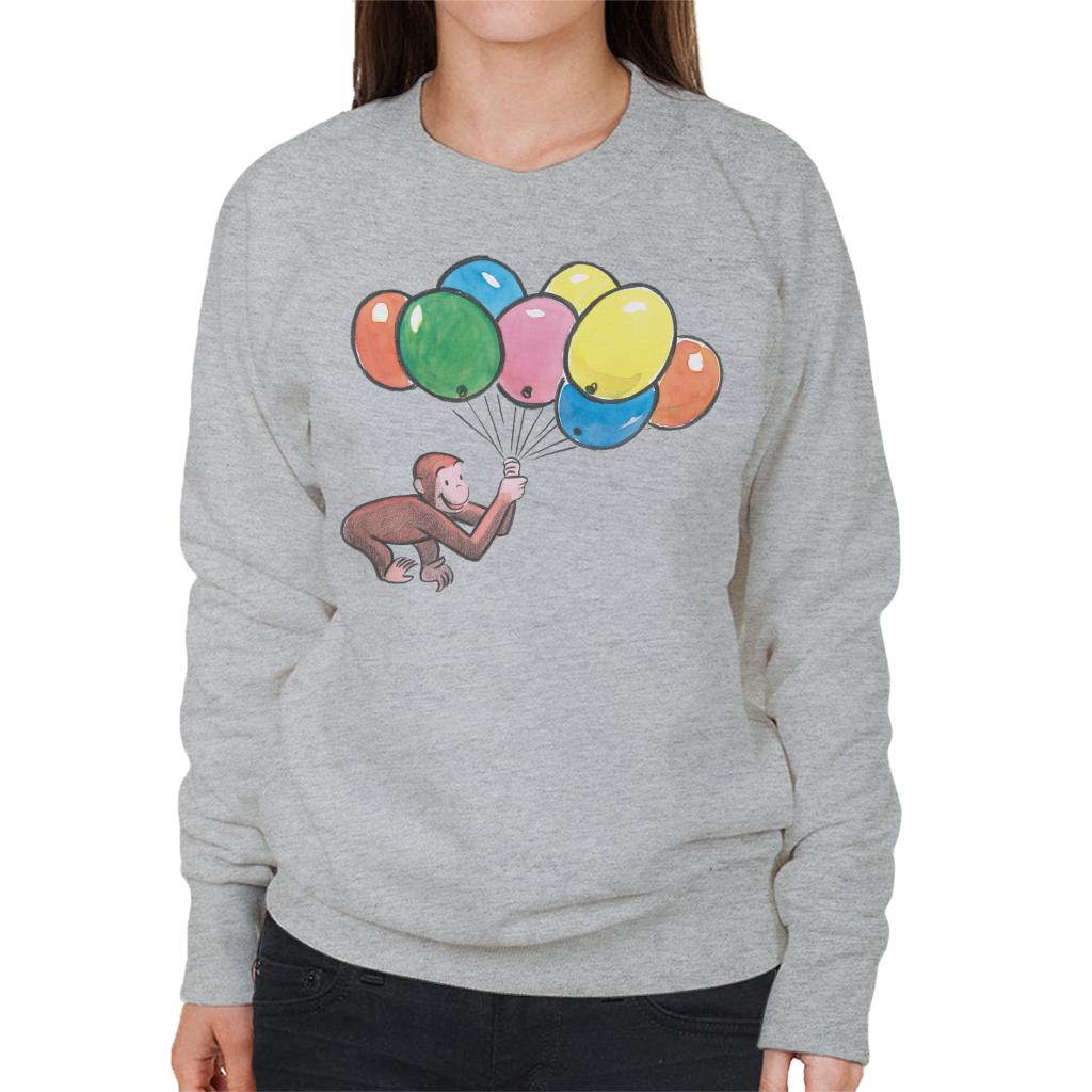 Curious George Holding Balloons Women's Sweatshirt product image 1